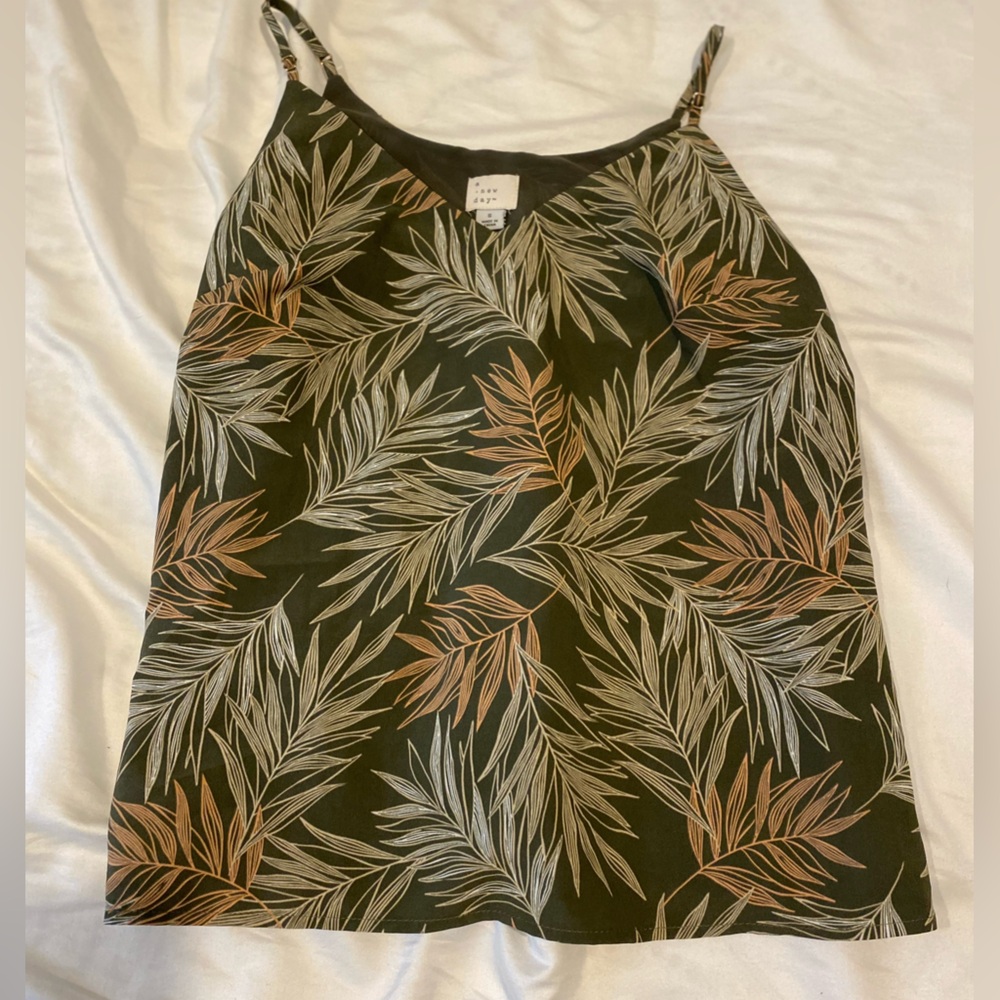 A green floral tank top